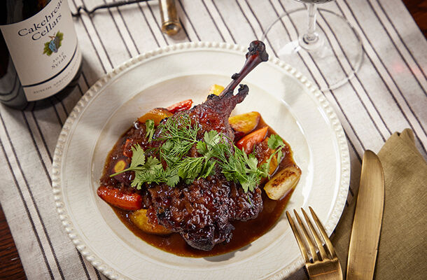 Braised Duck Legs with Pomegranate Molasses, Lime & Fresh Herbs