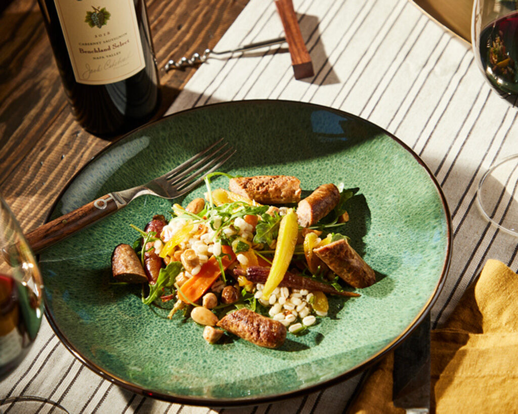 Moroccan Lamb Merguez Sausage with Roast Carrots, Barley, Dried Apricots and Almonds