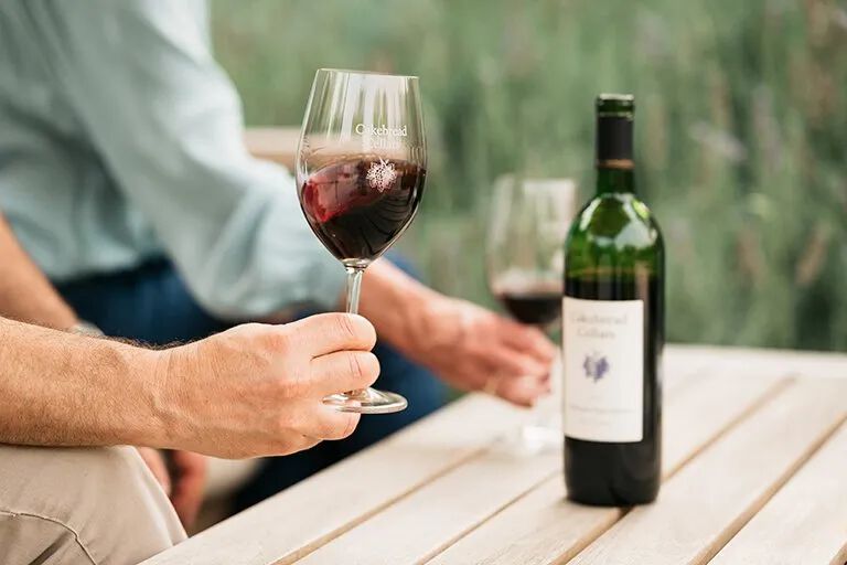 Man holding a glass of wine