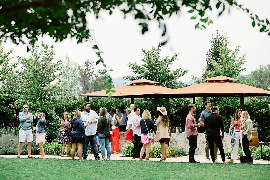 Guests sip and strolling in our South Courtyard